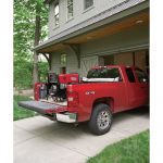 Outback 185 in red truck at home
